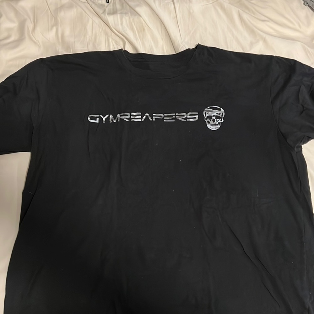 Gymreapers large black tee. XL. Work several times. Like new.